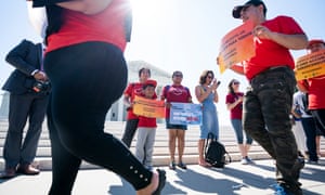 Immigration activists gathered outside the US supreme court as the justices ruled on the census on 27 June.