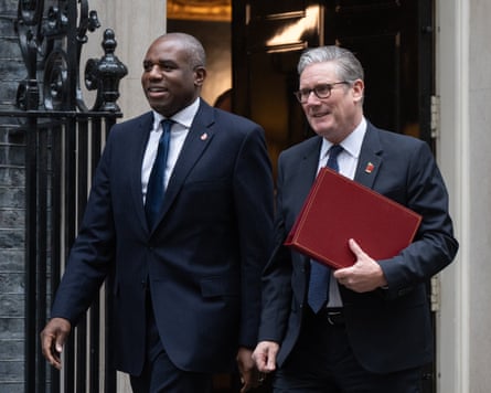 Keir Starmer and David Lammy leaving Downing Street For PMQs on 29 October.