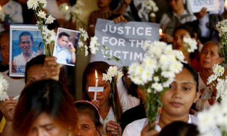 Relatives of victims in President Rodrigo Duterte’s so-called war on drugs hold a memorial for their loved ones in Manila