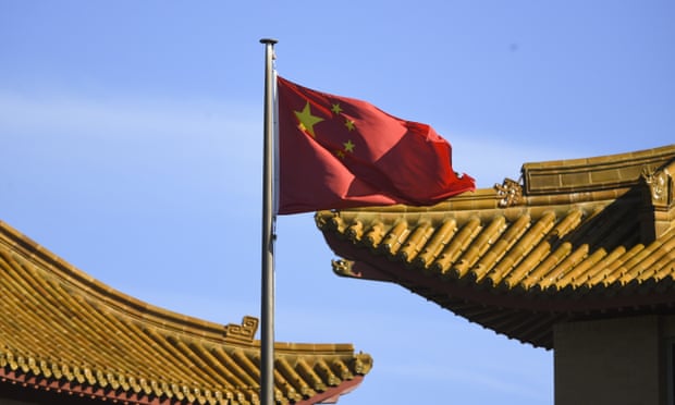 A Chinese national flag flies at the Chinese embassy in Canberra, 30 November 2020. 