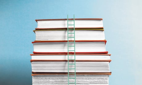 Ladder up stack of books<br>Tall white ladder leaning on 10 vintage books on wooden table, blue background