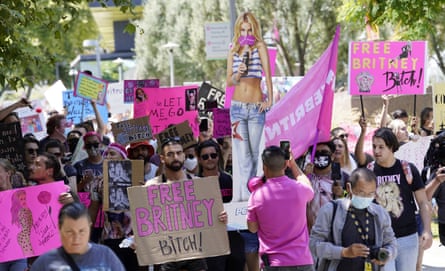 Britney Spears supporters march outside a the court house in Los Angeles during a hearing concerning the pop singer’s conservatorship.