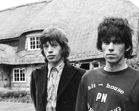 Keep on the grass … Mick Jagger and Keith Richards at Richards’ Redlands cottage in 1967.