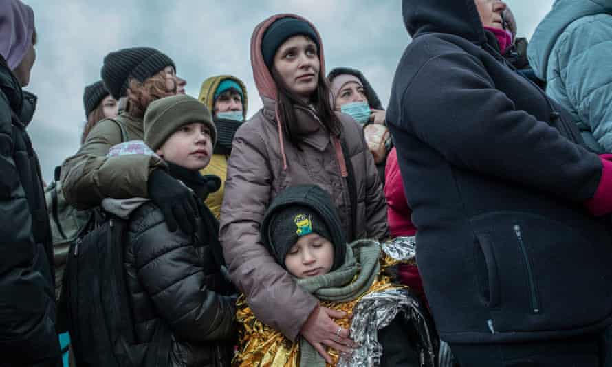 Ukrainian refugees arrive in Medyka, Poland, after crossing the border