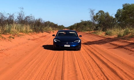 A Tesla on a dirt road