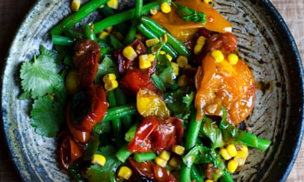 ‘Temper the sweetcorn’s sugar hit with climbing beans and the sourness of pomegranate molasses’: grilled corn, green beans.