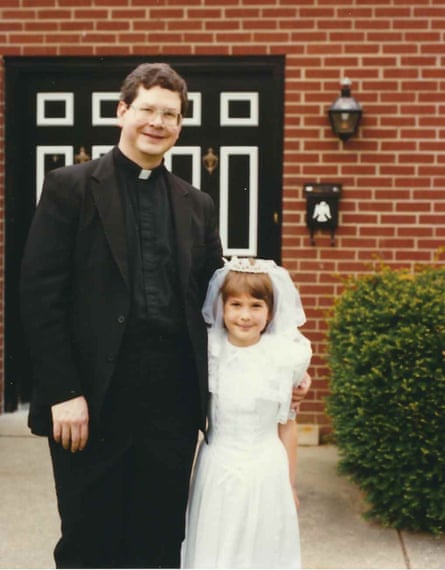 Patricia Lockwood in her First Communion dress, with her father Fr Greg Lockwood