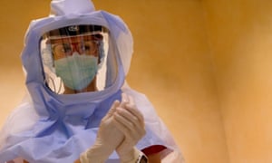 A nurse dresses up to enter the intensive care unit in a hospital in Rome, as coronavirus cases in Europe continue to rise.