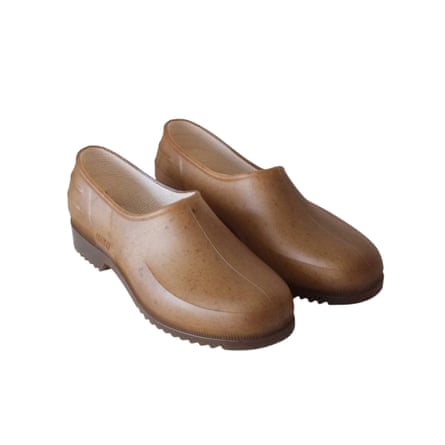 A pair of tan recycled PVC and hemp clogs with thick soles