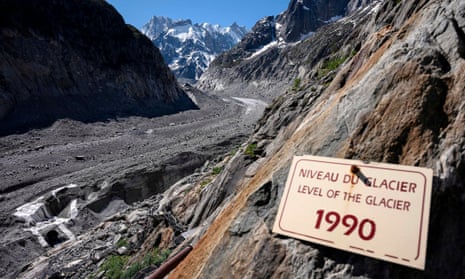A sign showing the retreat of the Mer de Glace glacier in Chamonix, France.