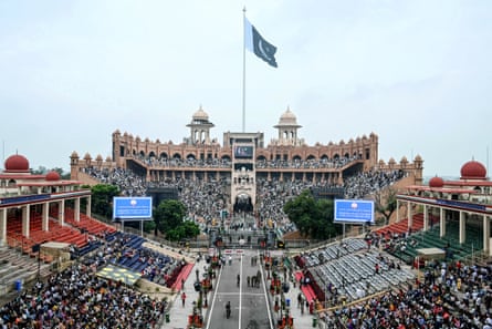 Indians and Pakistanis gather to watch the beating retreat ceremony at the Attari-Wagah border between Pakistan and India.