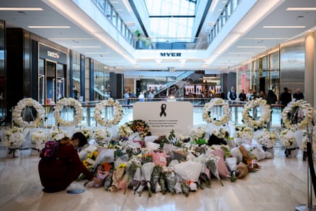 Flowers at a memorial site at the reopening of the Westfield Bondi Junction shopping centre