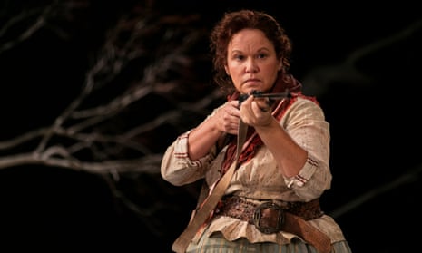 Molly (Leah Purcell) points her rifle at Yadaka, in her radical re-imagining of Henry Lawson’s story The Drover’s Wife for Belvoir.