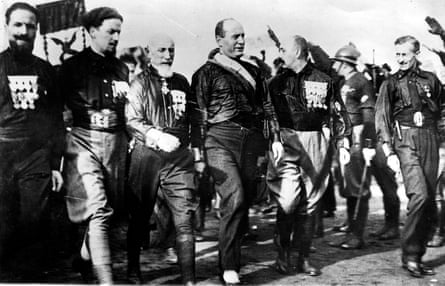 Black and white photo of men walking