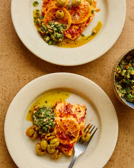 Ravinder Bhogal’s harissa baked hake with olives and walnut salsa.