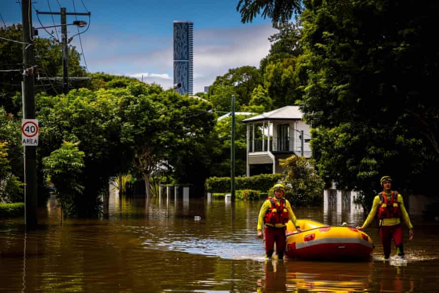 Rescue workers in the flooded streets of Paddington in February this year.