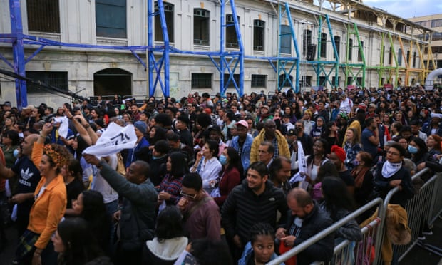 People gathered in the streets, cheering and celebrating.