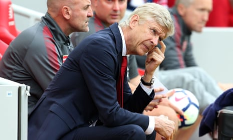 Arsène Wenger contemplates impending defeat against Liverpool at Anfield on Sunday.