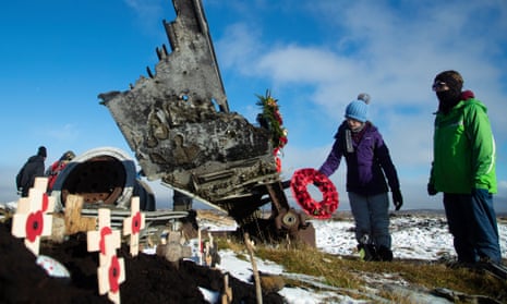 Freya Kirkpatrick lays a wreath on the wreckage of the US plane at Higher Shelf Stones in the Peak District, which crashed in 1948 killing all 13 men on board.