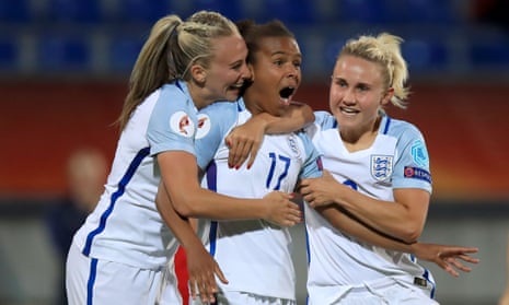 England’s Nikita Parris (centre) celebrates scoring her side’s second goal of the game with team mates Toni Duggan (left) and Isobel Christiansen.