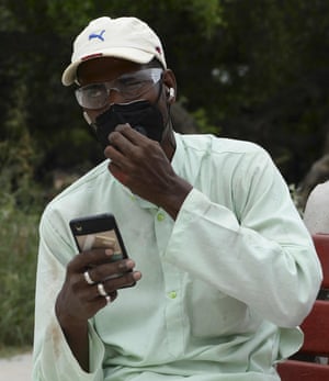 Delhi gravedigger Mohammed Shamim pictured last year at the start of the pandemic.