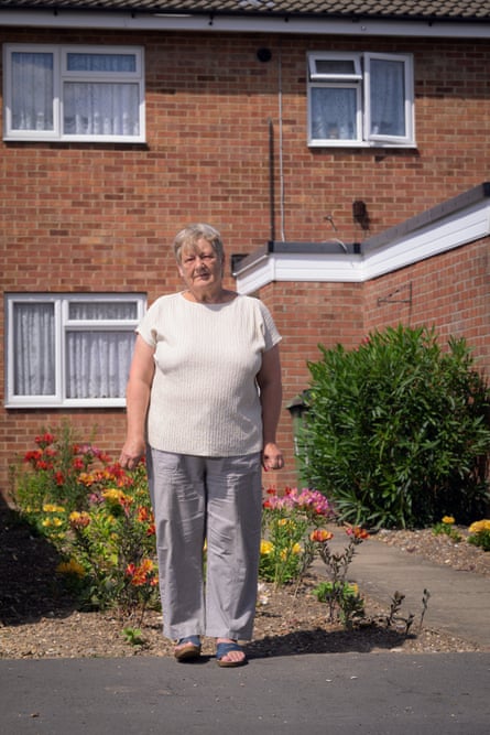 Jenny Hollis standing outside a terrace house