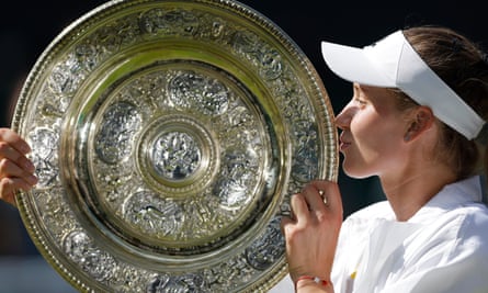 Elena Rybakina celebrates with the Wimbledon trophy