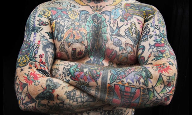 torso covered with tattoos