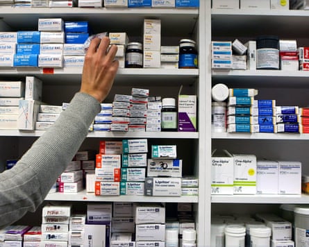 Pharmacy shelves filled with medications