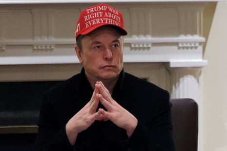 Elon Musk wears a ‘Trump Was Right About Everything!’ hat at a cabinet meeting at the White House on 24 March.