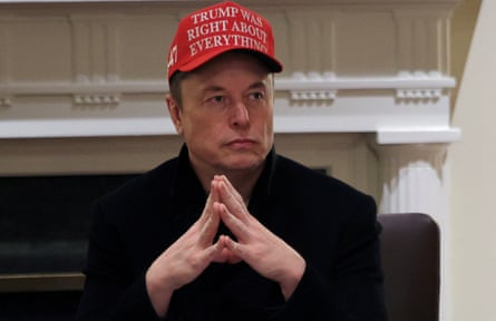 Elon Musk wears a red cap with the slogan: ‘Trump was right about everything!’