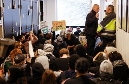 people hold signs that read ‘don’t have a heart of ice’ and ‘protect our students’