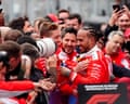 Lewis Hamilton shares a moment with his Ferrari colleagues after finishing second in Montreal.