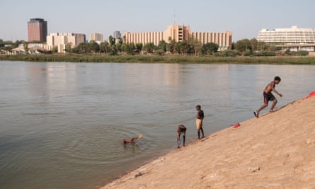 Children playing along the bank of the Niger River in Niamey in January.