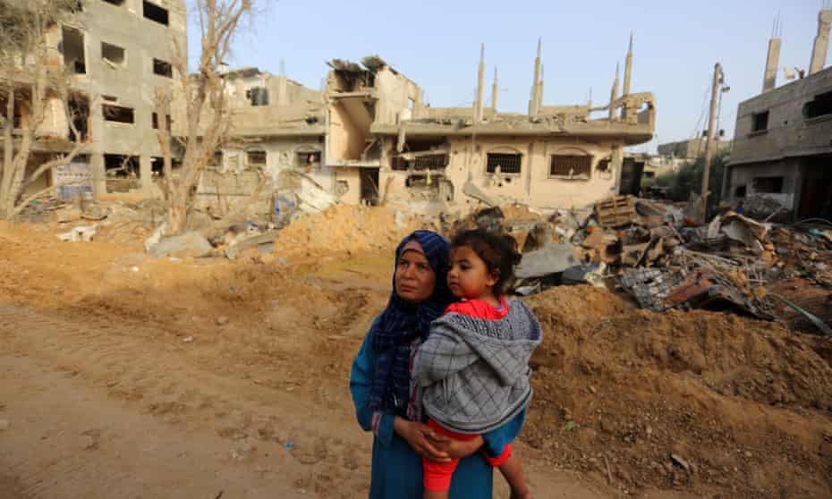 Palestinians return to houses destroyed by Israeli airstrikes, Beit Hanoun, Gaza, on 21 May 2021.