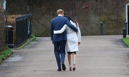Prince Harry and Meghan leave a photocall after announcing their engagement in November 2017.