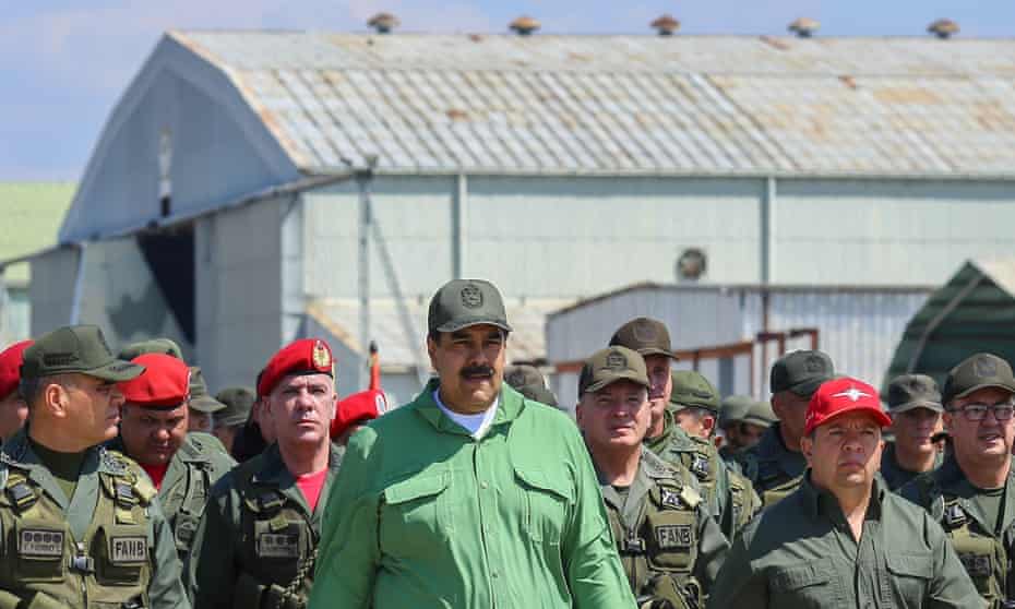 Nicolás Maduro takes part in a ceremony during military exercises at the Libertador Air Base in Maracay