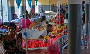 Expectant mothers lie on beds in the maternity ward of the Kalisizo General Hospital in Kalisizo, Uganda. 