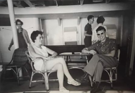 BLack and white photo of Sylvia and Bill Jones sitting in chairs on the deck of a ship.