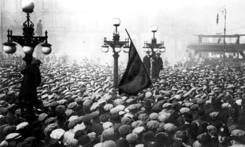 Crowds of striking workers raise the red flag in George Square, Glasgow, in January 1919.