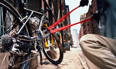 Chain reaction … a bike thief cutting a lock.