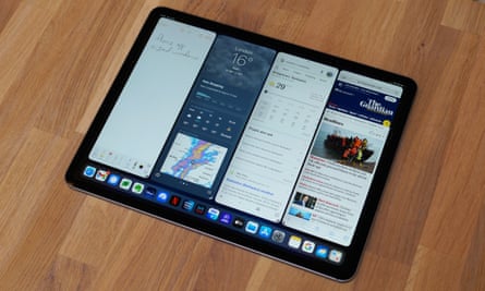 Four apps on an iPad Pro resized like an iPhone with Stage Manager.