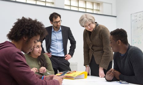 Theresa May with students and teacher