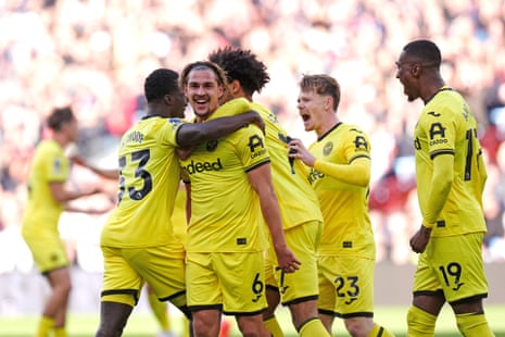 Yehor Yarmolyuk (centre) celebrates scoring Brentford's first goal of the game with teammates.