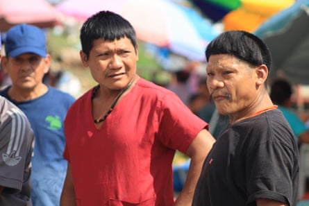 Xuxu, right, and his friend Txitxopi, Indigenous men in the street in Tabatinga.