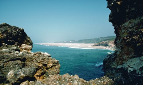 A vintage shot of an undeveloped stretch of coast in southern Portugal, as Rose Macaulay might have seen it on her Iberian travels.