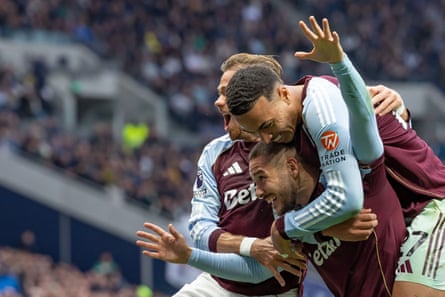 Emiliano Buendia celebrates with Morgan Rogers and Matty Cash after scoring Aston Villa’s winner at Tottenham.