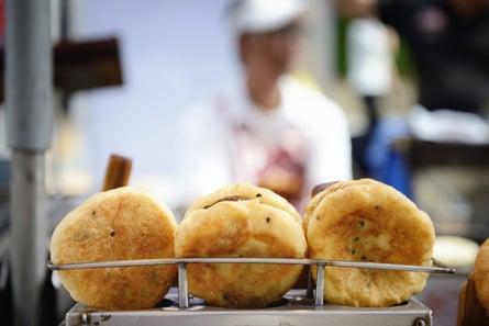 A little rack of grilled Korean pancakes called Ssiat Hotteok