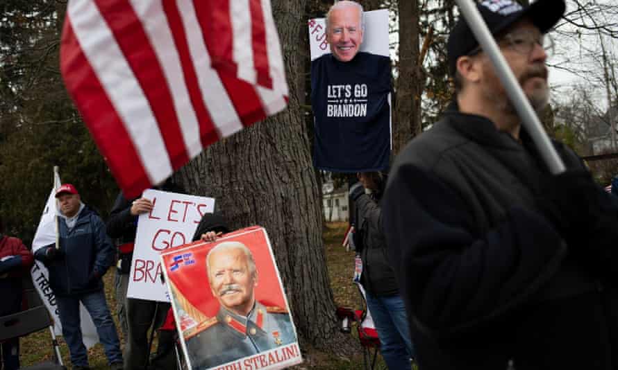 Supporters listen to speakers as people gather to attend a Let’s Go Brandon Festival rally, promoted by the Michigan Conservative Coalition and in opposition to U.S. President Joe Biden, in the Brandon Township village of Ortonville, Michigan, U.S., November 20, 2021. REUTERS/Emily Elconin2H76889 Supporters listen to speakers as people gather to attend a Let’s Go Brandon Festival rally, promoted by the Michigan Conservative Coalition and in opposition to U.S. President Joe Biden, in the Brandon Township village of Ortonville, Michigan, U.S., November 20, 2021. REUTERS/Emily Elconin