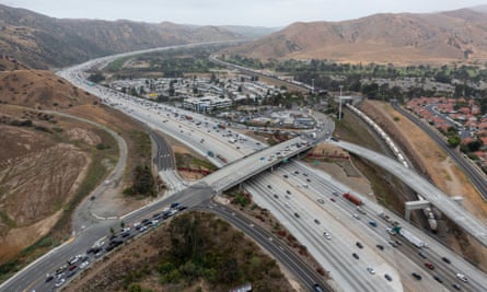 An aerial view of traffic on the 91 Freeway and the Green River Road overpass in California.